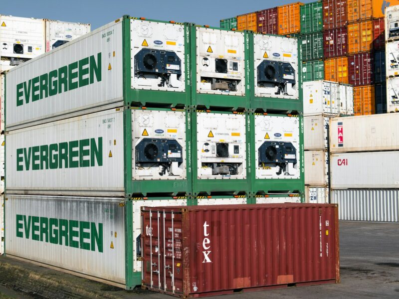 Shipping containers at a commercial port for imported renewable energy equipment